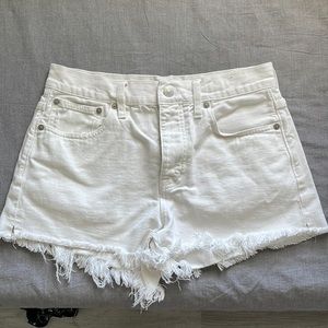 Madewell white frayed shorts.